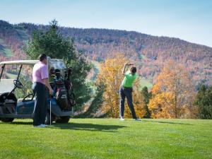 Windham Country Club golfers and golf cart