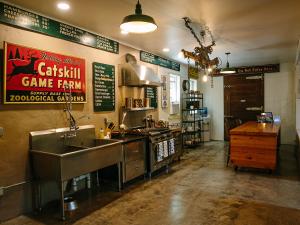 Kitchen in the Long Neck Inn with original Old Catskill Game Farm sign