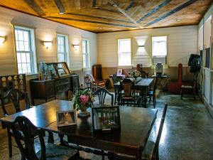 Dining room at the Long Neck Inn with booths and tables