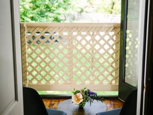 porch sitting area with 2 chairs at the Long Neck Inn