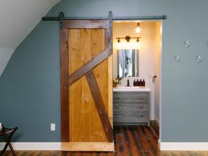 Barn sliding bathroom door in a guest room at the Long Neck Inn