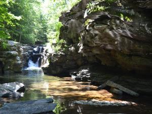 waterfall at Purling waters camp and glamp site