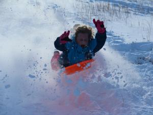 child sledding
