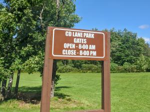 sign with park hours