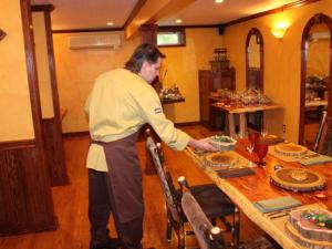 person putting food on table