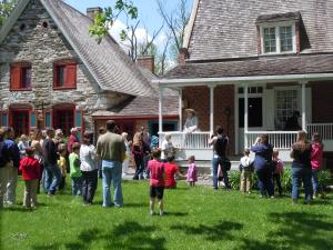 School children listing to a tour at the main Bronck Museum house