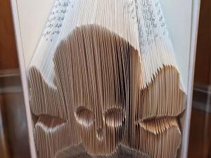 Book folding options are dog paw, skull, ghost or pumpkin