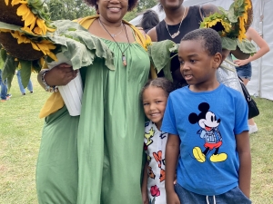family with sunflowers