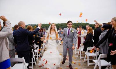 Bride and groom walking down the aisle at Historic Catskill Point