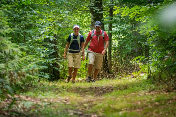 couple walking on platte clove trail