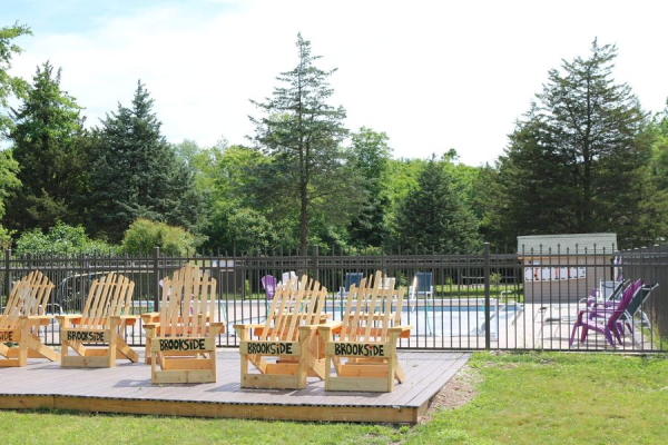 Pool at brookside campgrounds with chairs