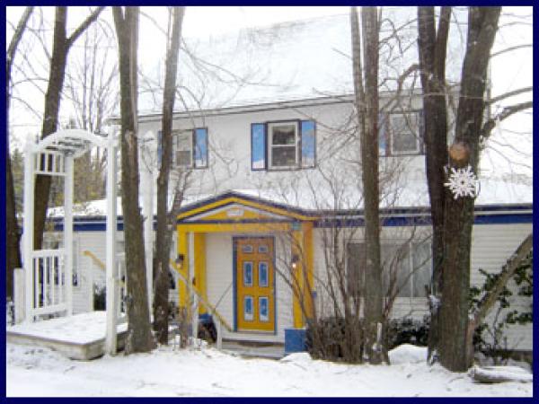 Snowed Inn B&B exterior in winter