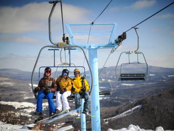 Chairlift with skiiers