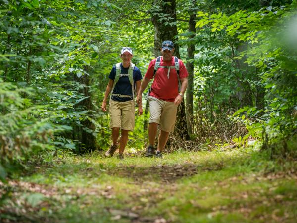 couple walking on platte clove trail