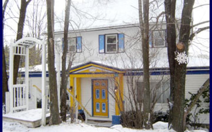 Snowed Inn B&B exterior in winter