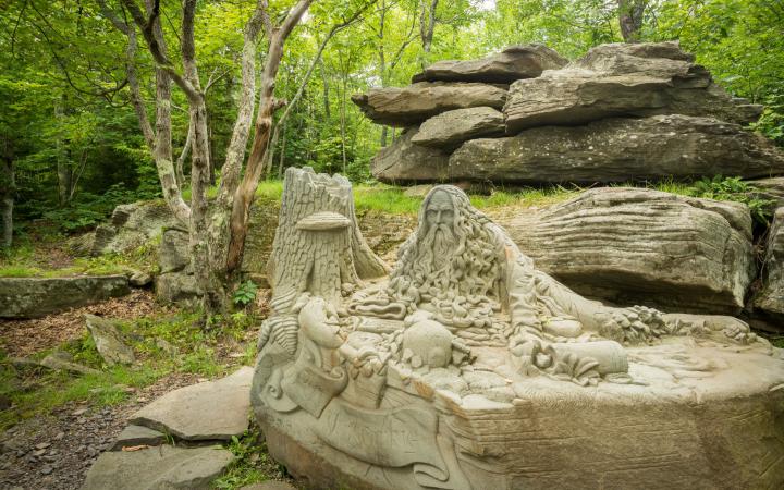 Rip Van Winkle monument carving out of blue stone on Hunter Mountain
