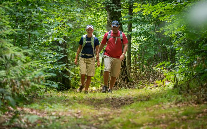 couple walking on platte clove trail